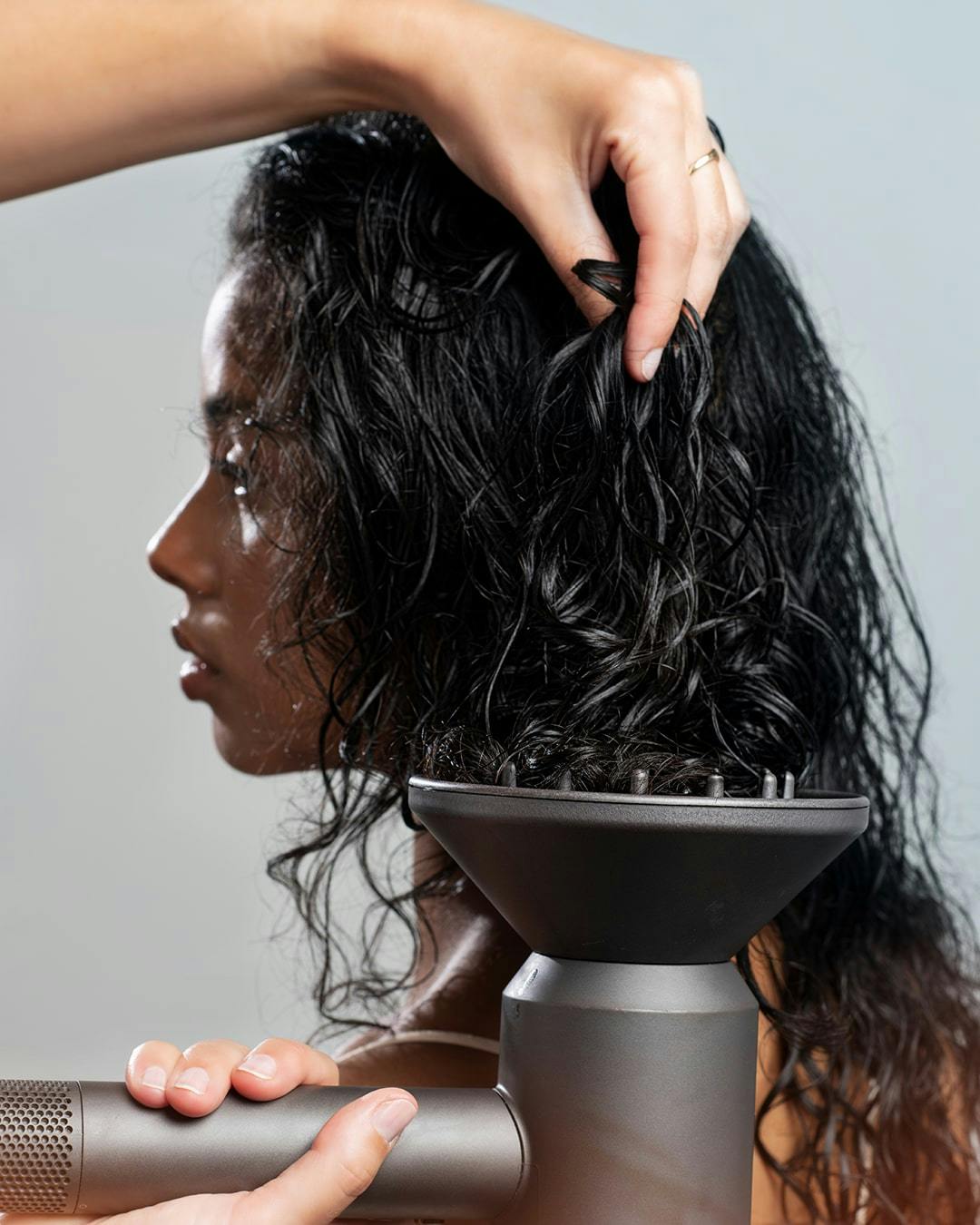 Image of Keune Haircosmetics model getting a blow-out